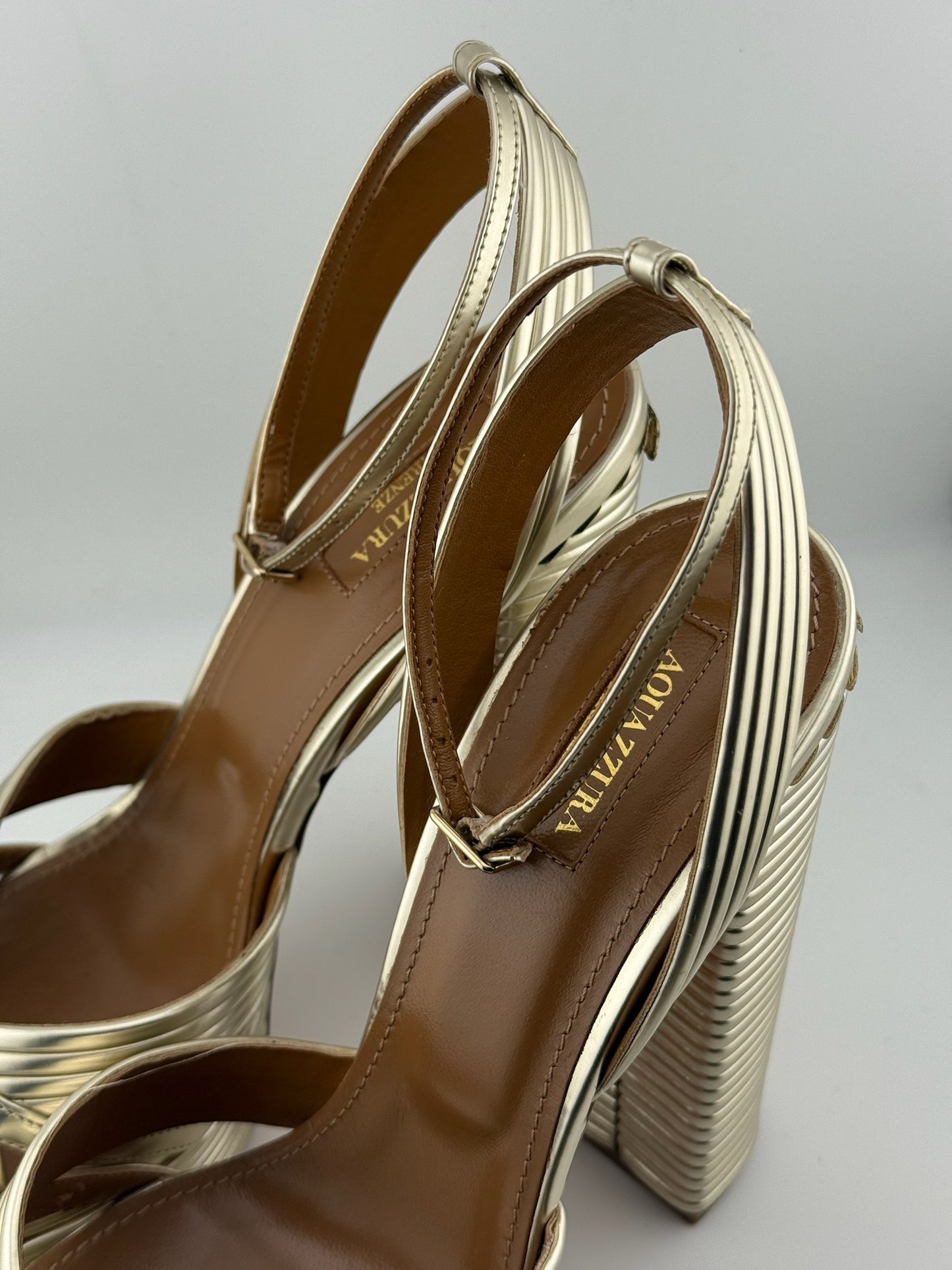 Aquazzura Gold ribbed heels