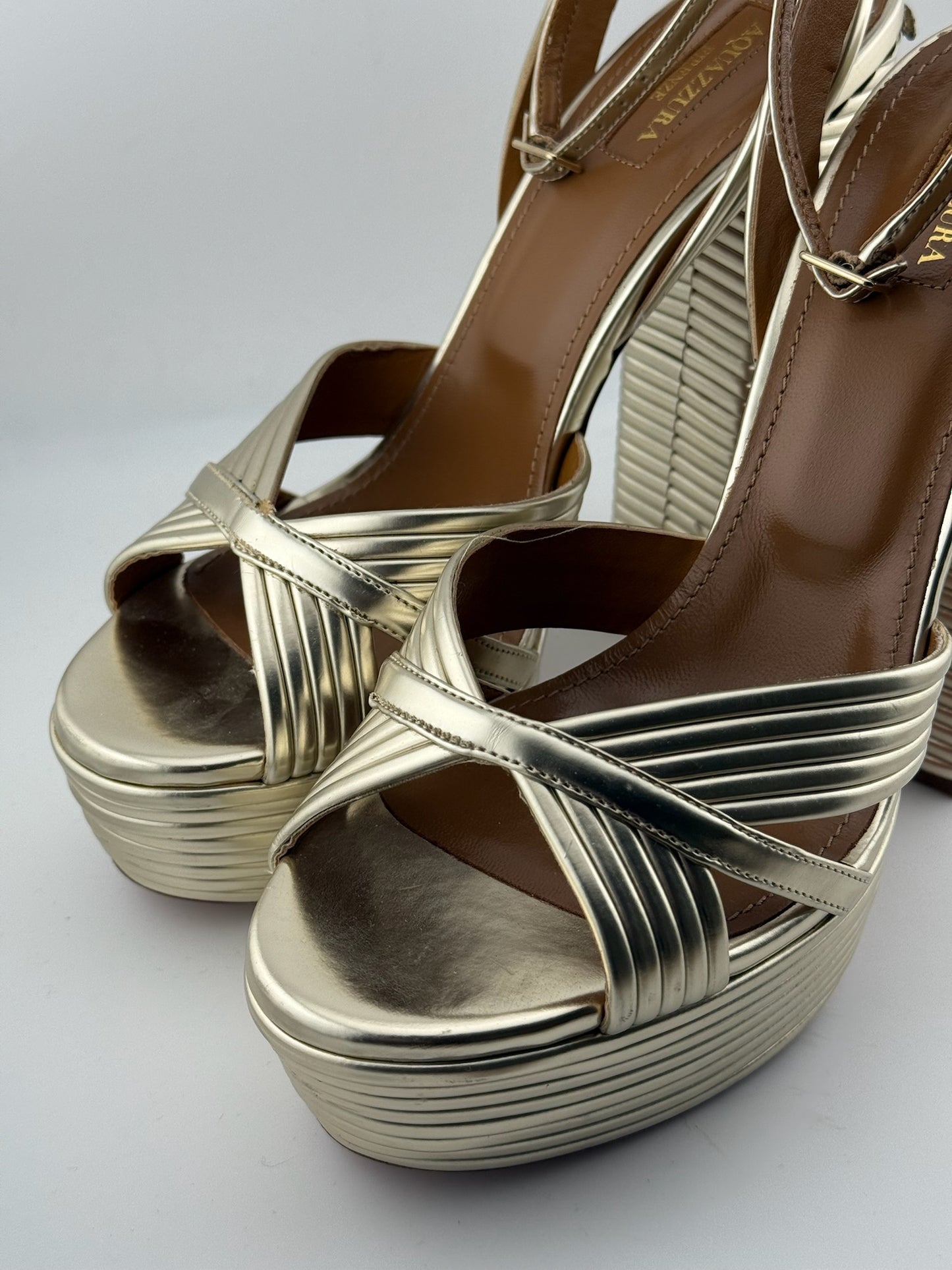 Aquazzura Gold ribbed heels