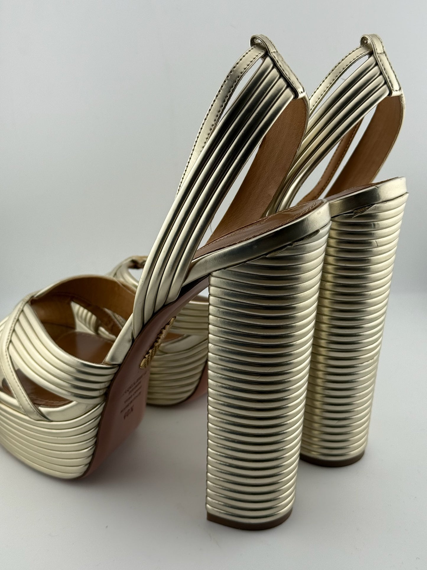 Aquazzura Gold ribbed heels