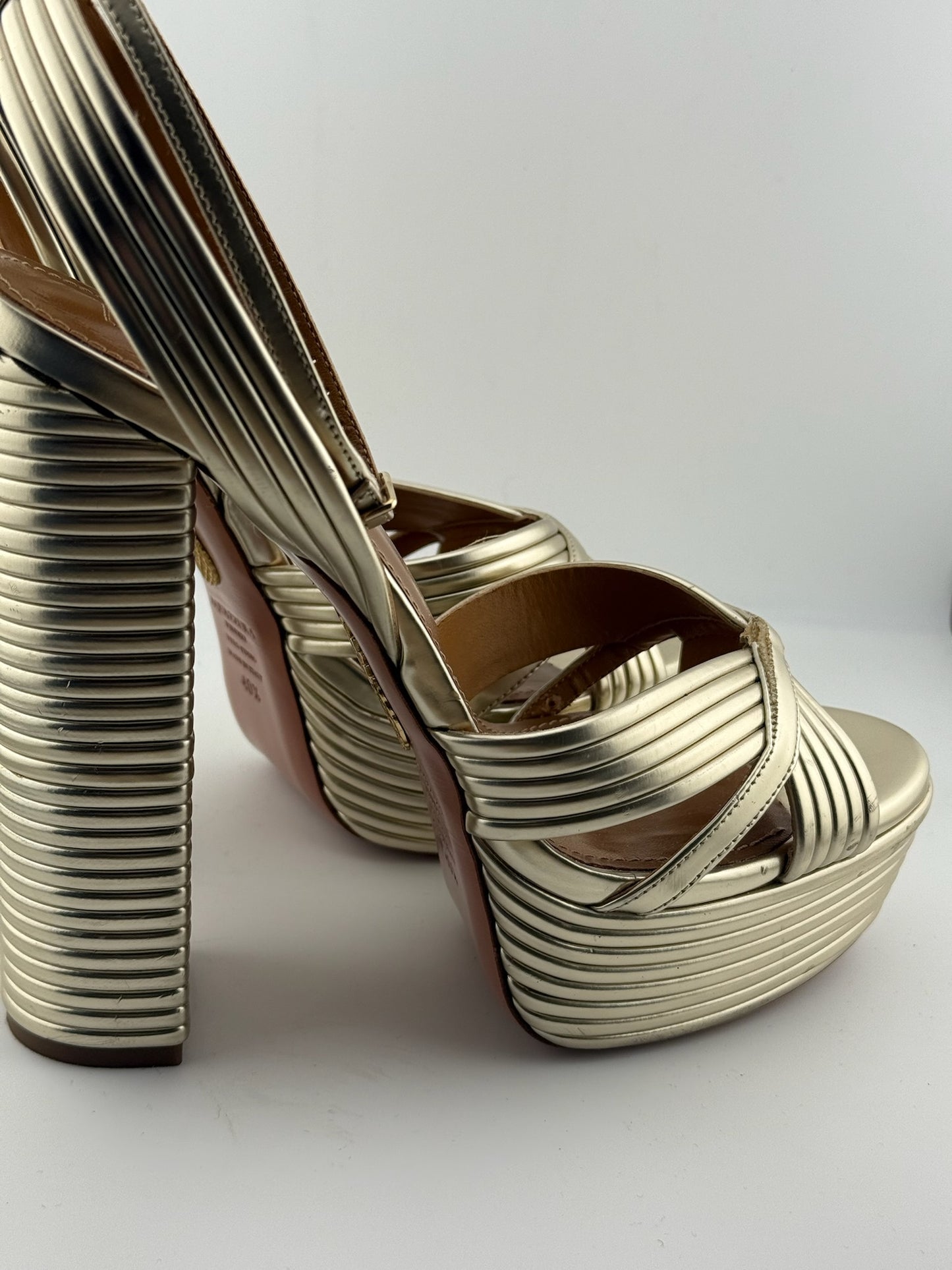 Aquazzura Gold ribbed heels