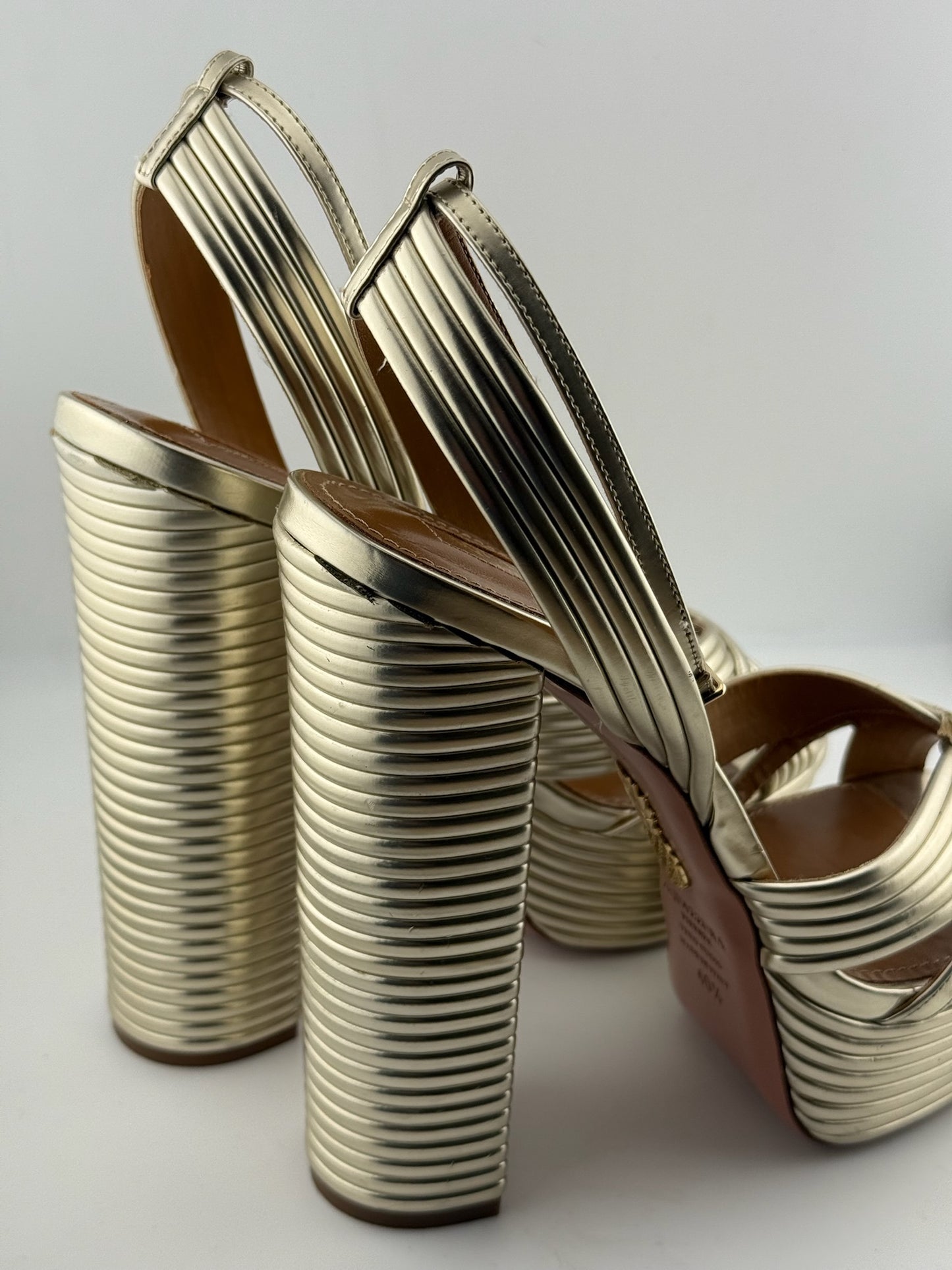 Aquazzura Gold ribbed heels