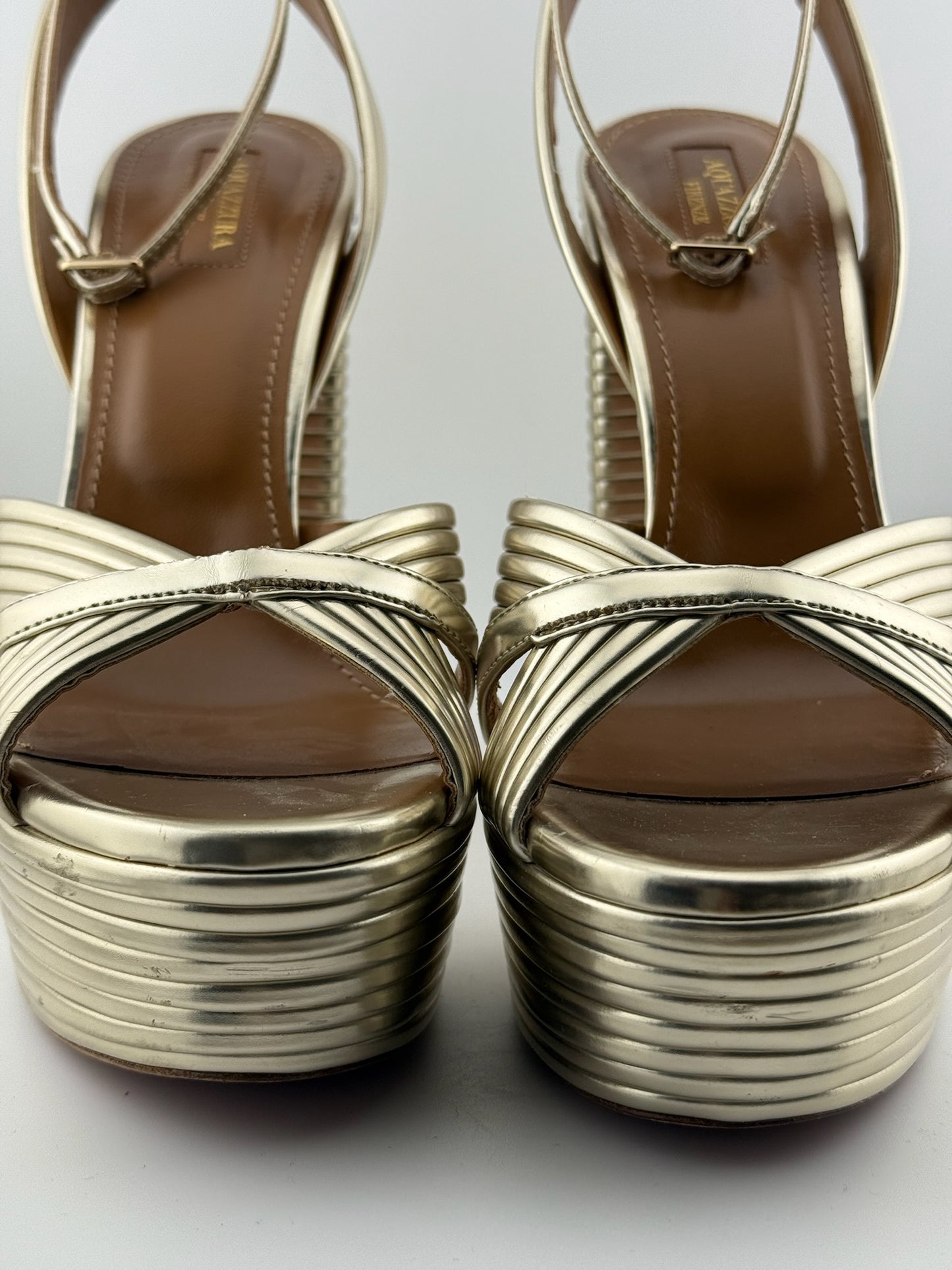Aquazzura Gold ribbed heels